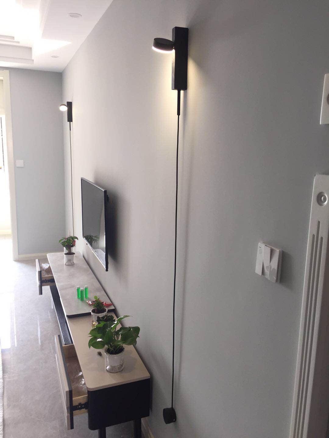 Axis wandlamp